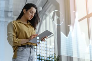 Medium Shot Woman Holding Tablet - Nuvecon